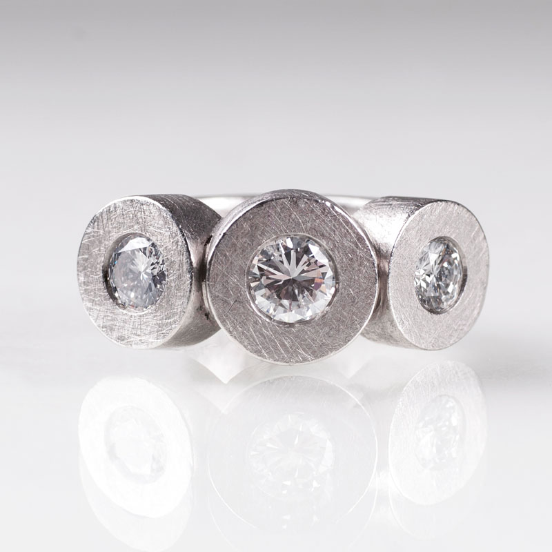 A modern platinum ring with diamonds by Jeweller Geisen