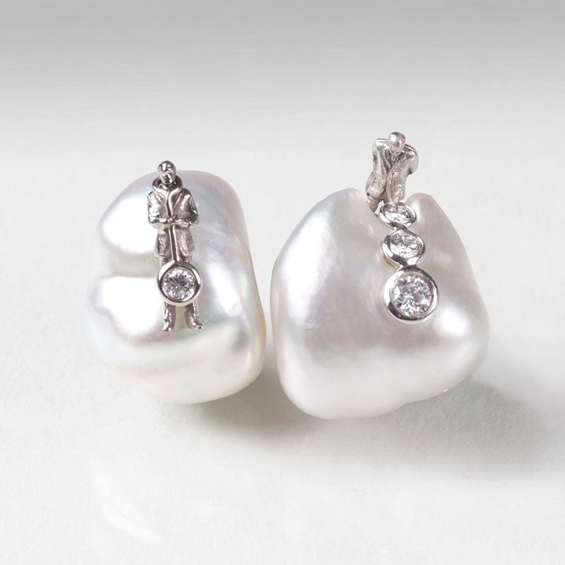 Two pearl diamond pins