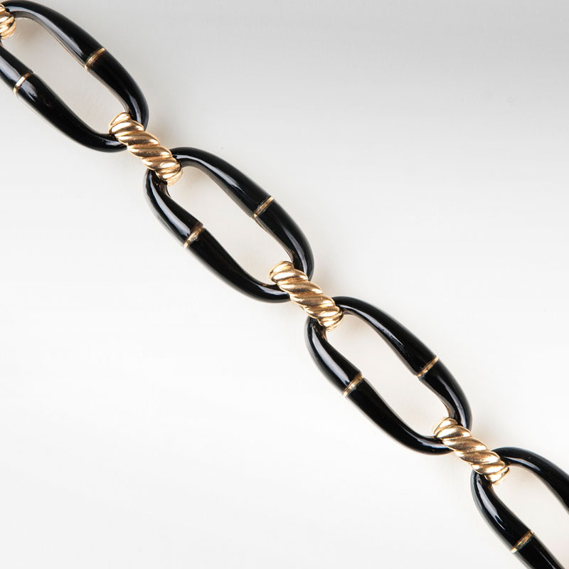 A modern gold onyx bracelet