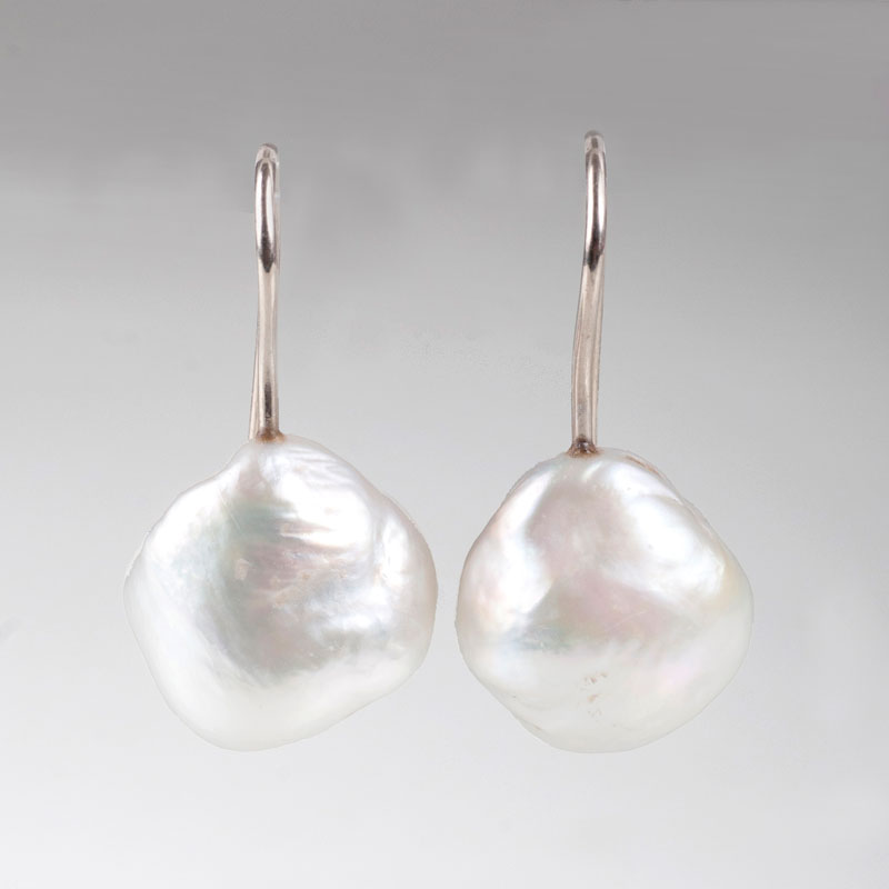 A pair of pearl earrings