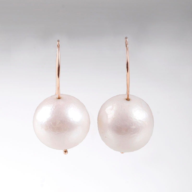 A pair of pearl earrings