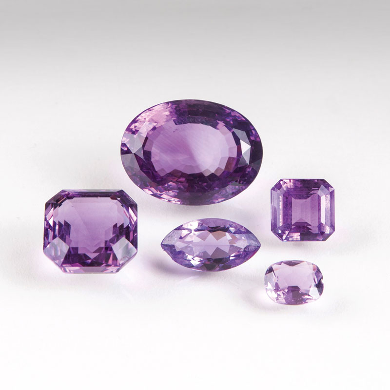 Five loose amethysts