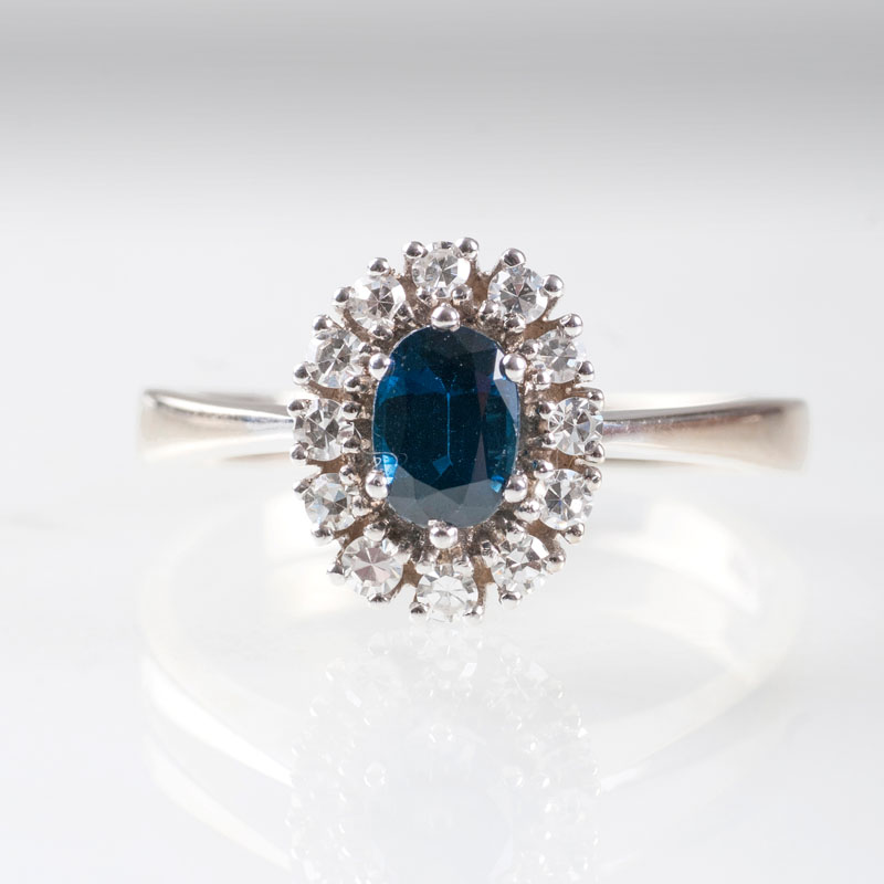 A petite diamond sapphire ring