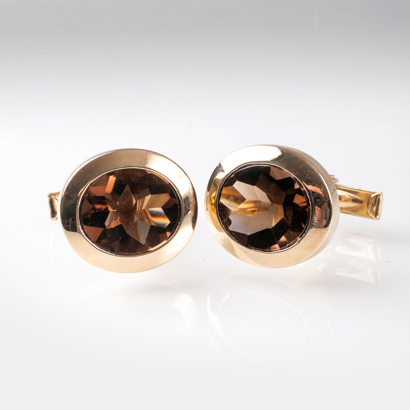 A pair of modern cufflinks with smoky quartz