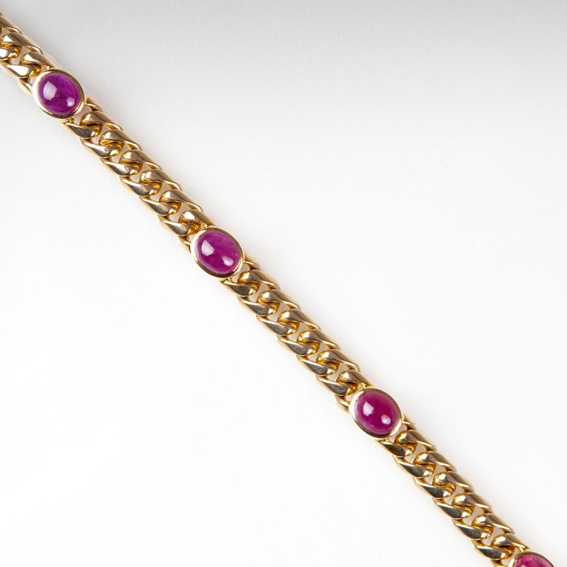 A curb chain bracelet with rubies