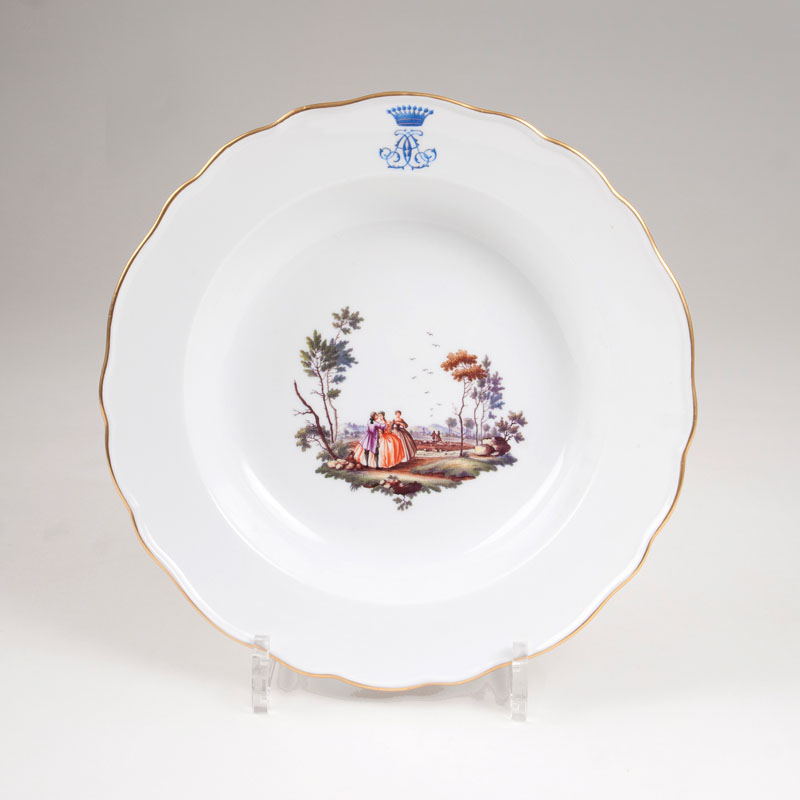 A plate with Watteau painting and crowned monogram