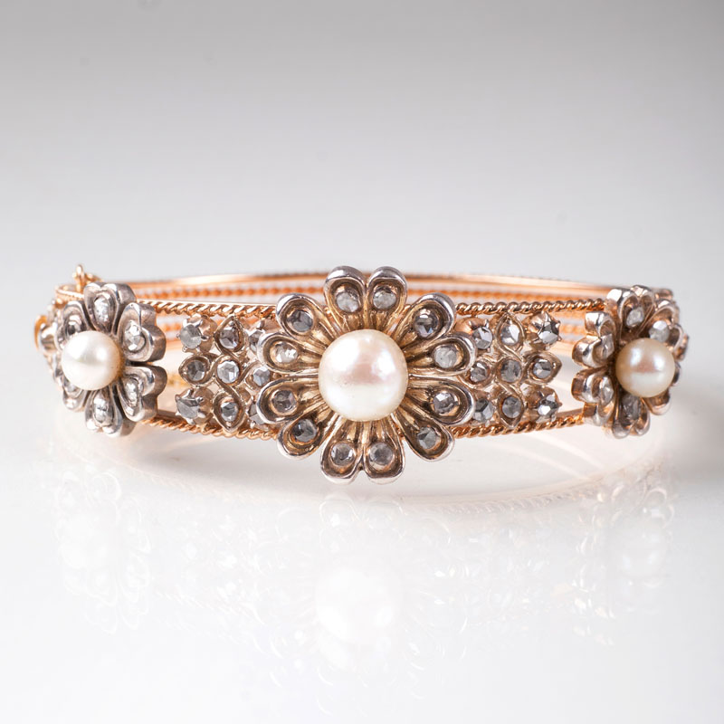 An antique pearl diamond bangle bracelet
