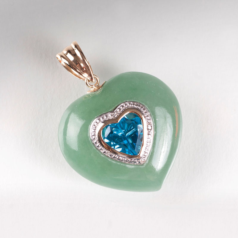 A heartshaped jade pendant with topaz setting