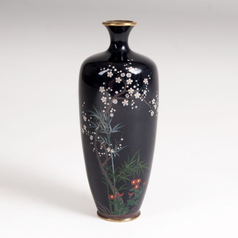 A small Cloisonné narrow neck vase with prune blossoms