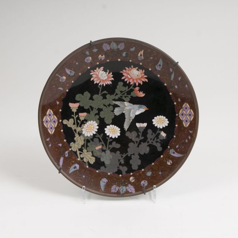 A Cloisonné plate with flower and bird decor