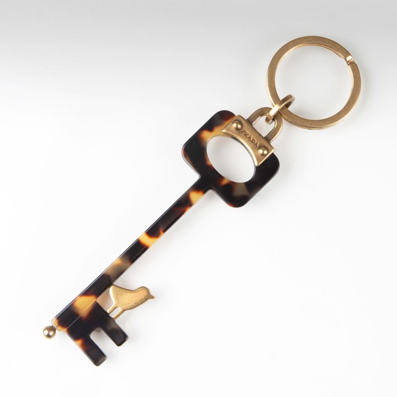 A key ring with bird decor