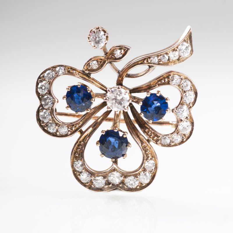 An Art Déco diamond sapphire brooch