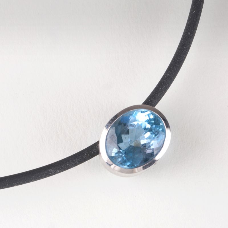 A modern aquamarine pendant with collar by H.C. Kay