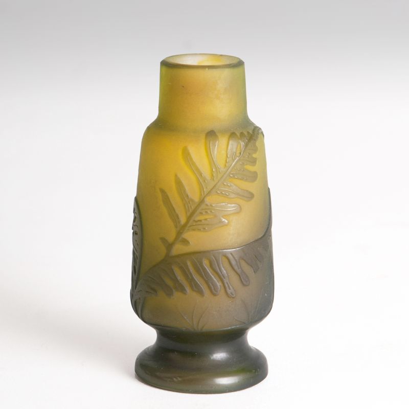 A miniature vase with ferns