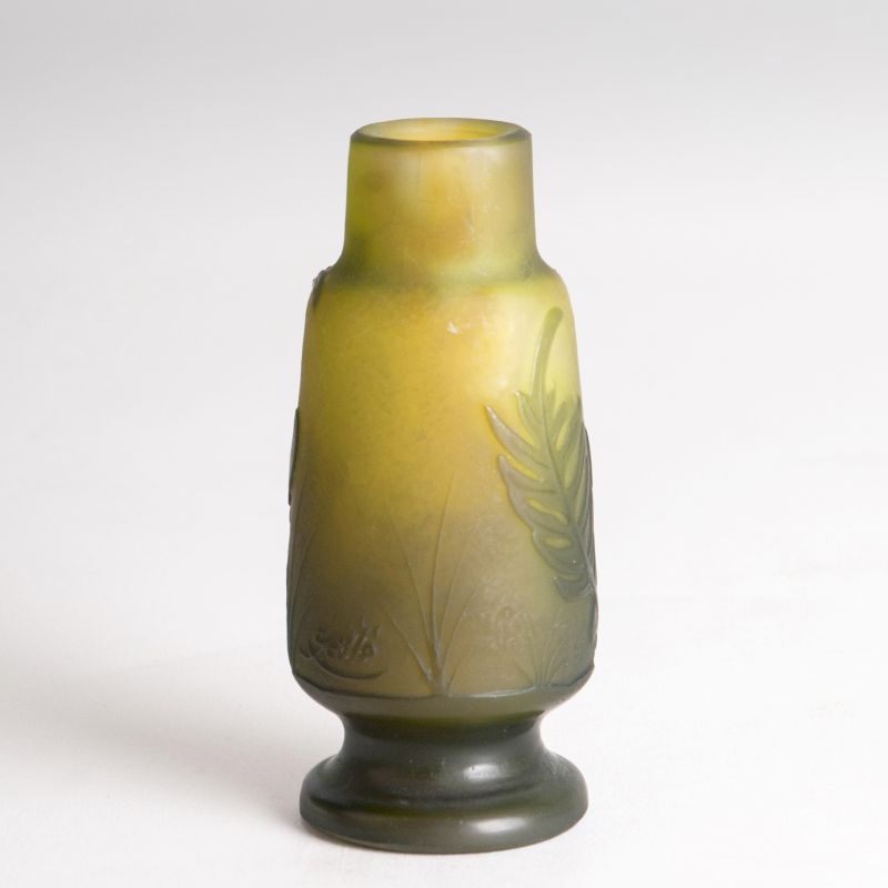 A miniature vase with ferns - image 2