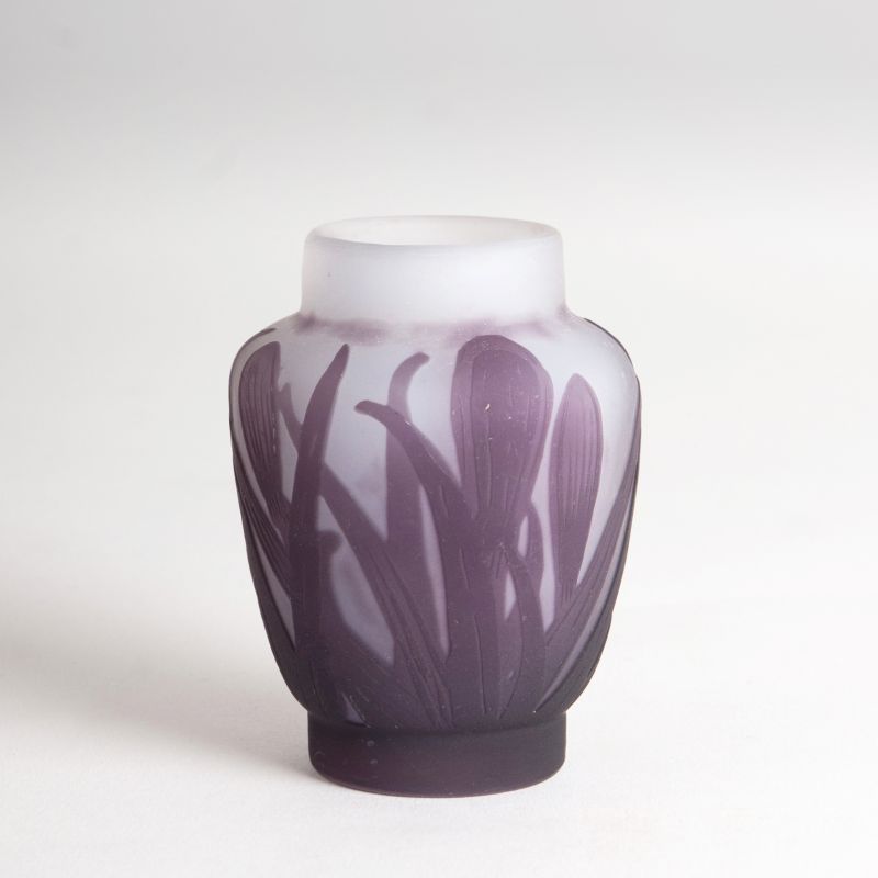 A miniature vase with crocusses
