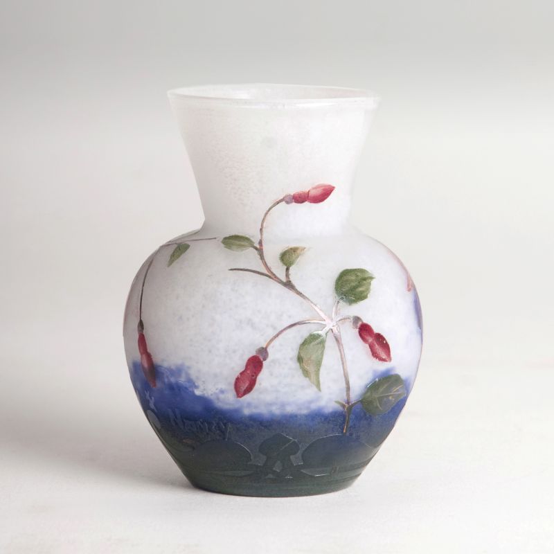 A miniature vase with colorful fuchsias - image 2