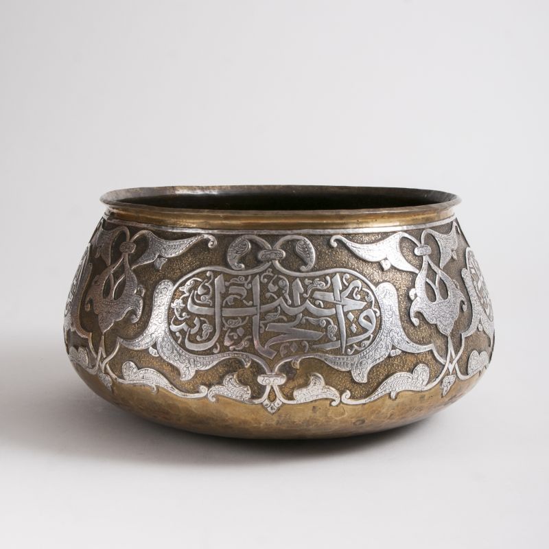 A rare large Mamluk Revival bowl with silver and brass overlay