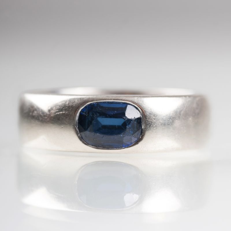 A gold ring with sapphire