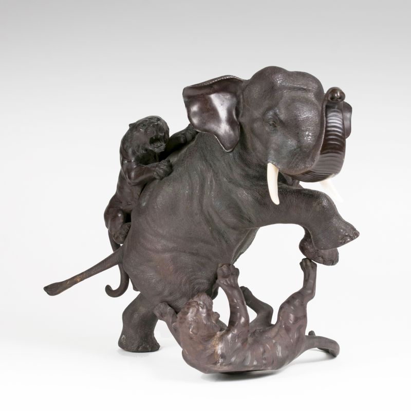 An excellent bronze group 'Elephant attacked by two tigers'