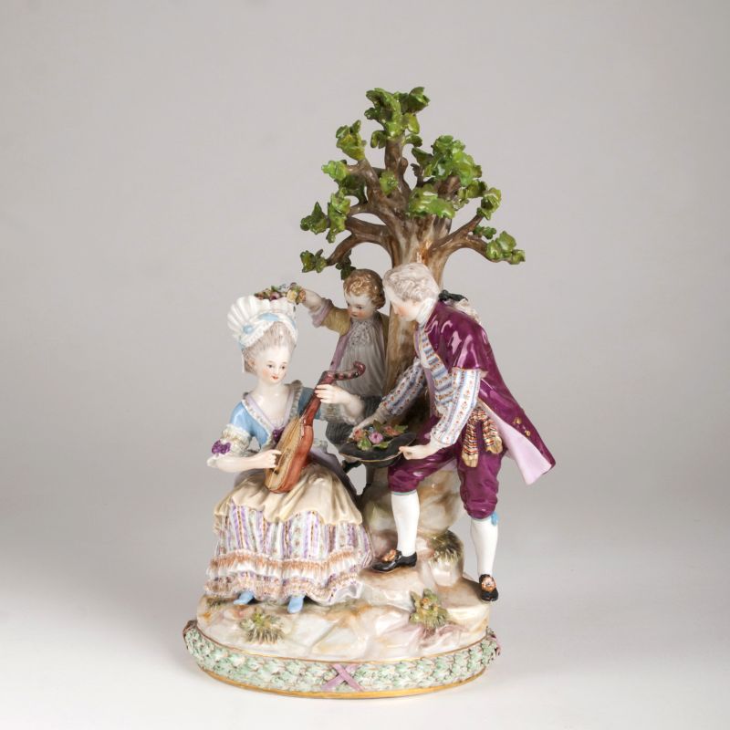 A porcelain figure group 'Cavalier  and lady with lute'