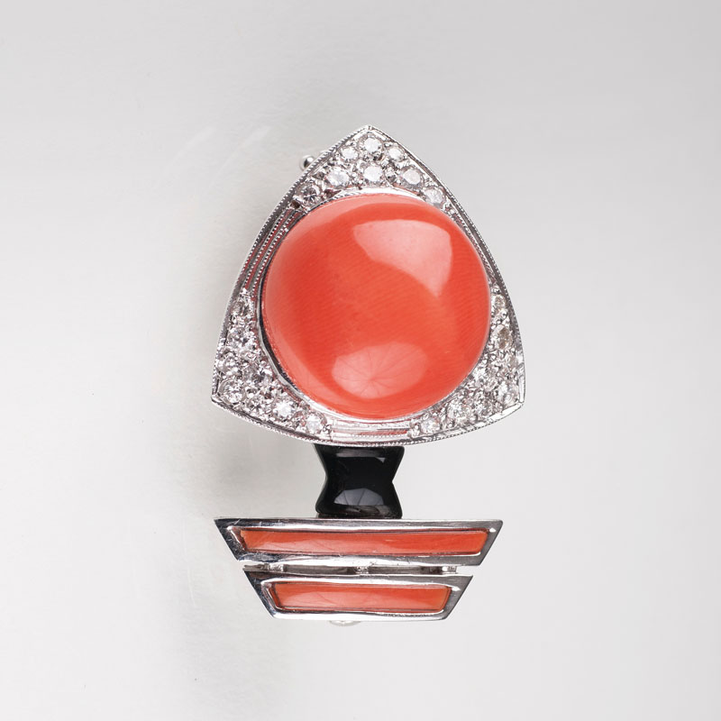 A coral diamond brooch in Art Déco style