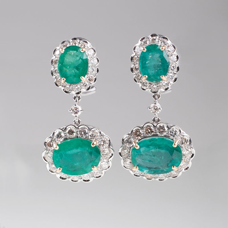 A pair of highcarat emerald diamond earpendants