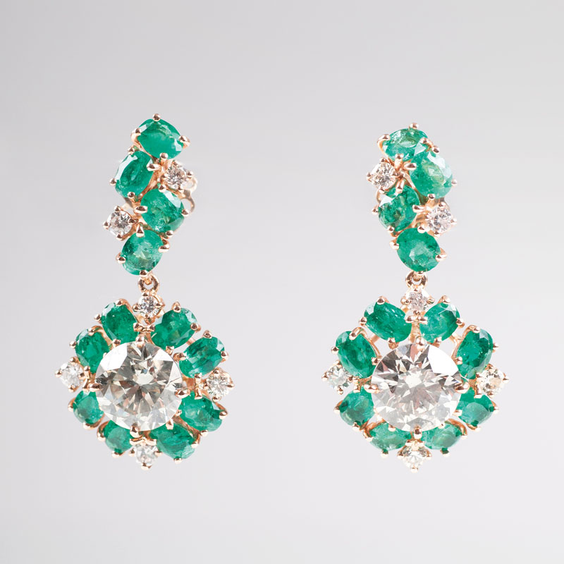 A pair of extraordinary diamond emerald earrings