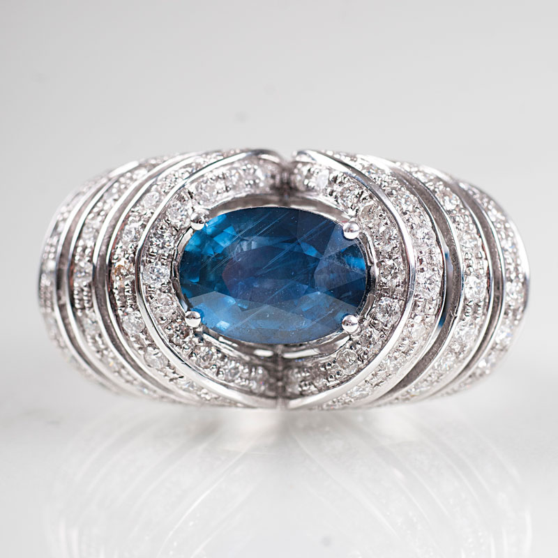 A modern sapphire diamond ring