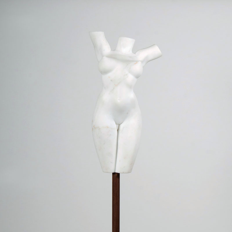 A marble sculpture 'Erotic female torso'