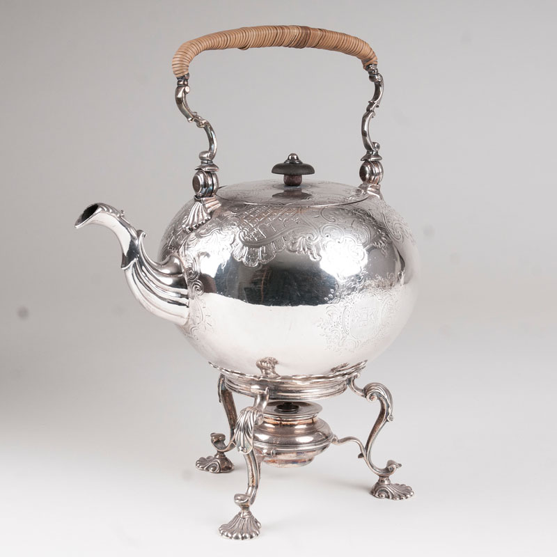 A georgian teakettle on a rechaud