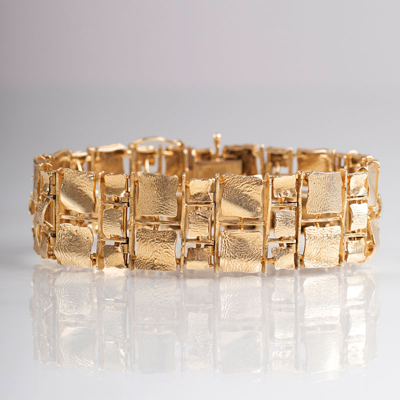 A golden bracelet in modern design