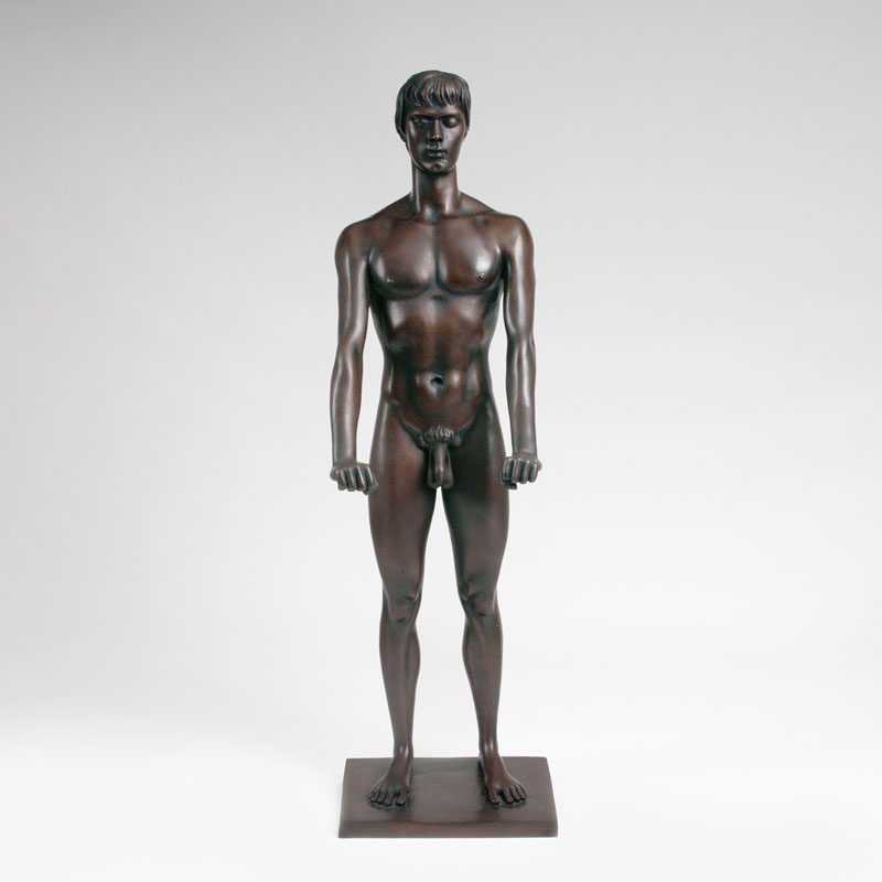 A bronze sculpture 'Standing youth'