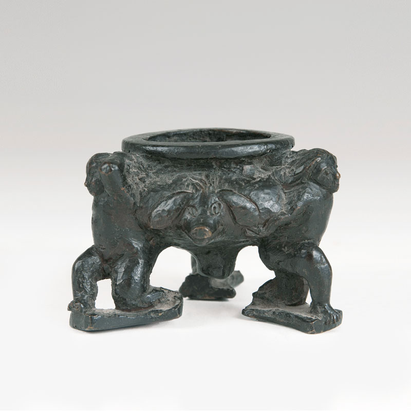 A Renaissance bronze inkwell with 3 boys
