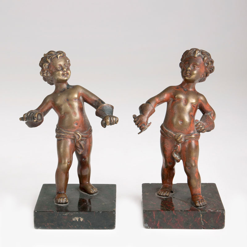 A pair of bronze sculptures 'Fencing boys'