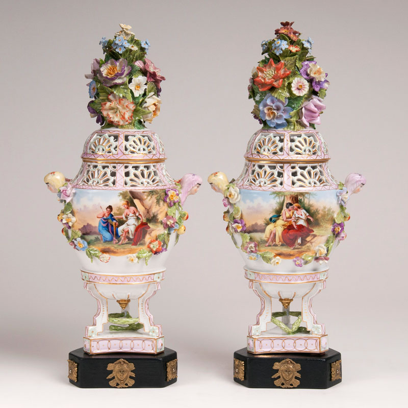 A pair of large potpourri vases with mascarons