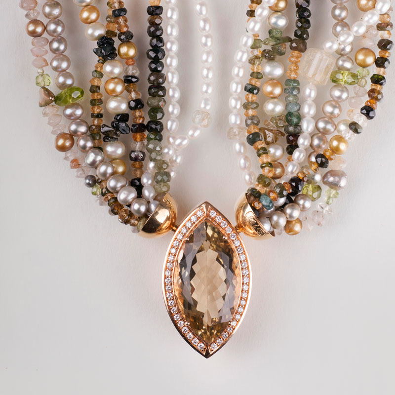 A multicoloured tourmaline citrine quartz necklace with a large lemon-citrine diamond clasp
