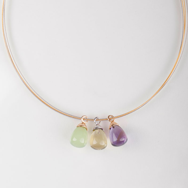 Three modern coloured stone pendant on bangle necklace