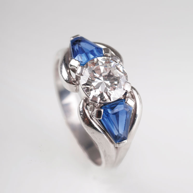 A solitaire diamond ring sapphires