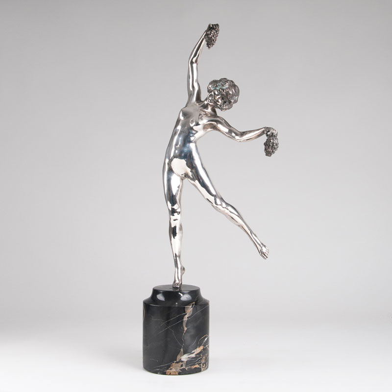 A silvered bronze sculpture 'Dancing Girl with Grapes'