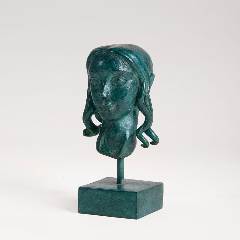 A small bronze 'Angel's head'