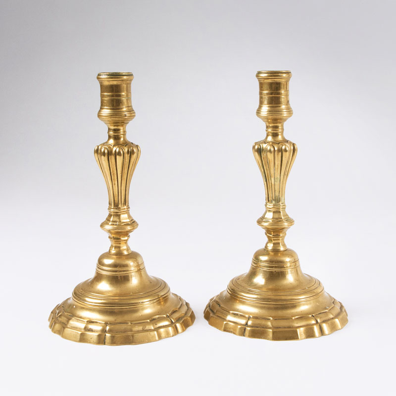 A pair of baroque candle holders