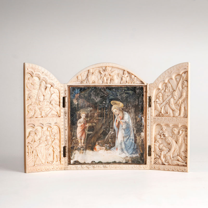 A small ivory triptych 'Virgin adoring the Child'