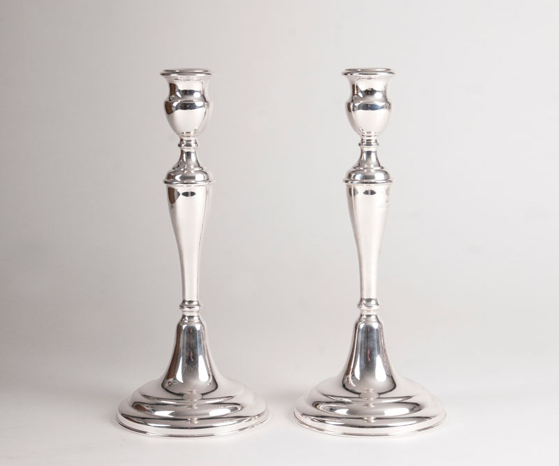 A pair of medium-high elegant candlesticks