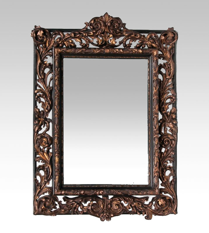 A large Baroque Mirror with Florentine frame