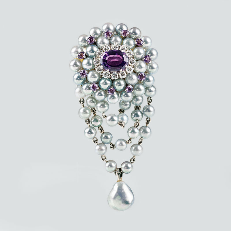 A pearl amethyst brooch with diamonds