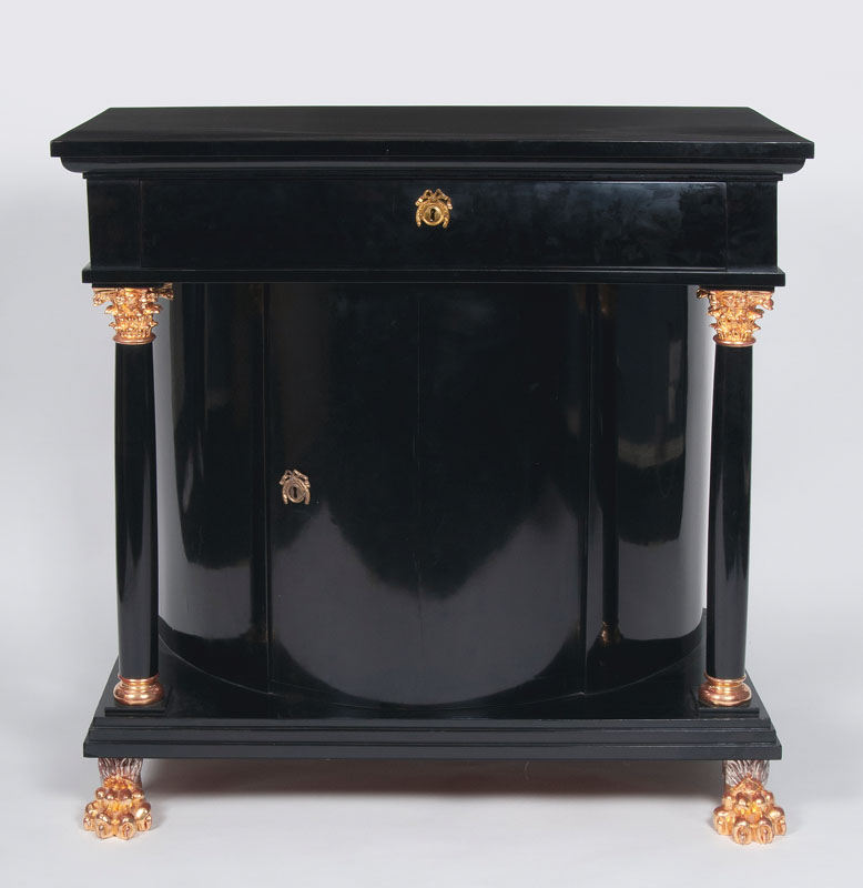 An elegant Biedermeier half-cabinet