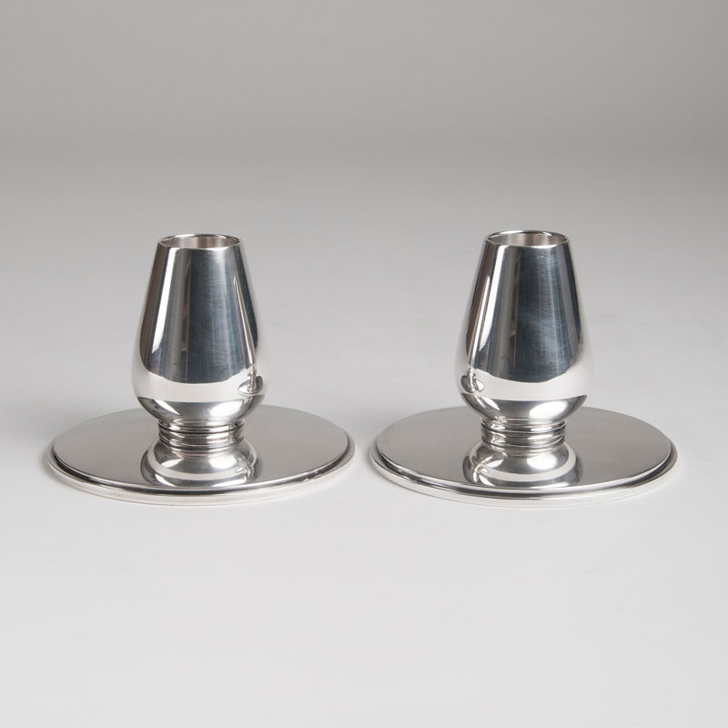 A pair of mid-century candlesticks