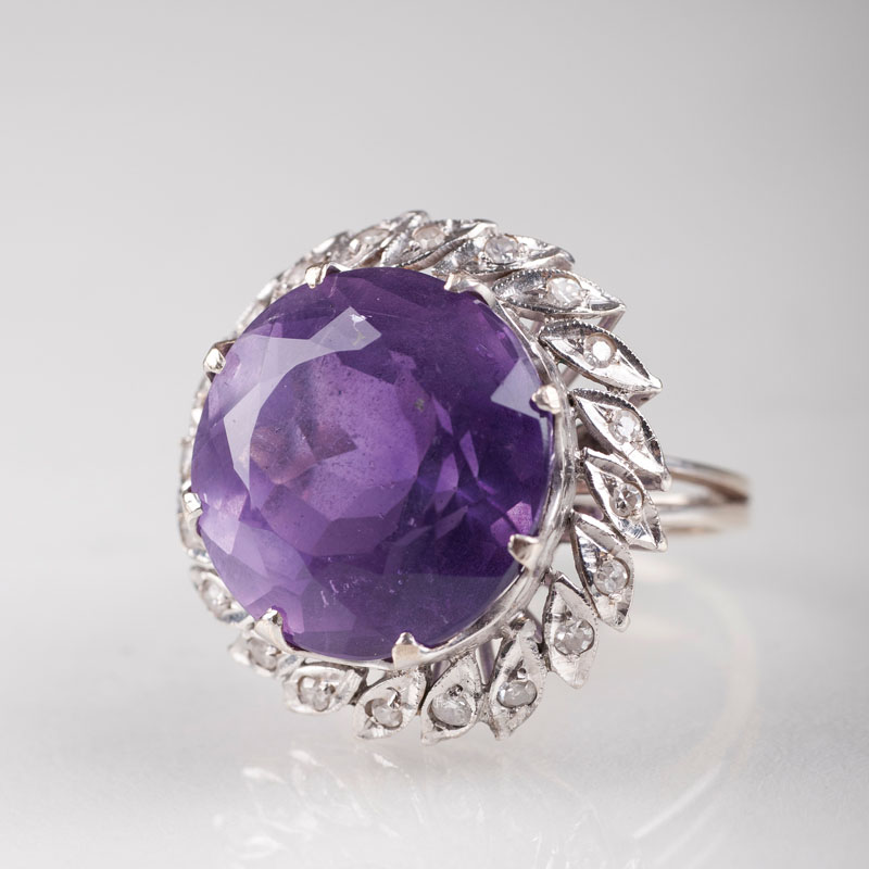 A large Vintage amethyst diamond ring