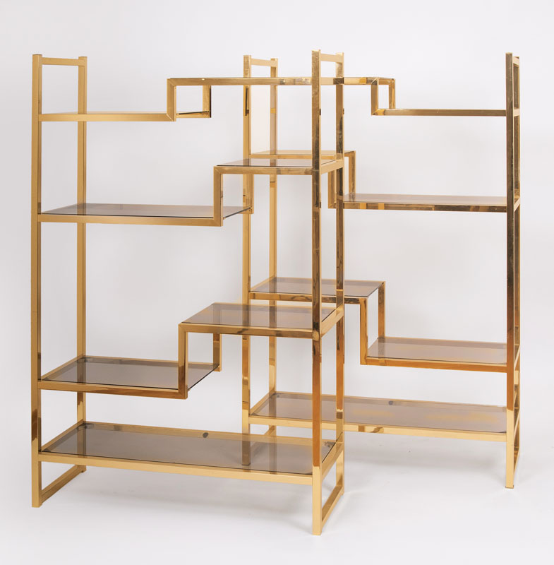 A pair of brass bookshelves by Romeo Rega